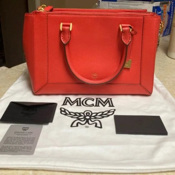MCM Handbags - MCM shoulder/handbag/crossbody in Coral Red Saffiano Authenticated COA
